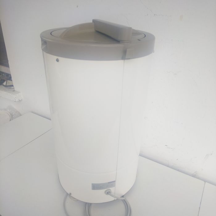 Компактна преносима сушилня за дрехи MIELE с вместимост 3 кг.