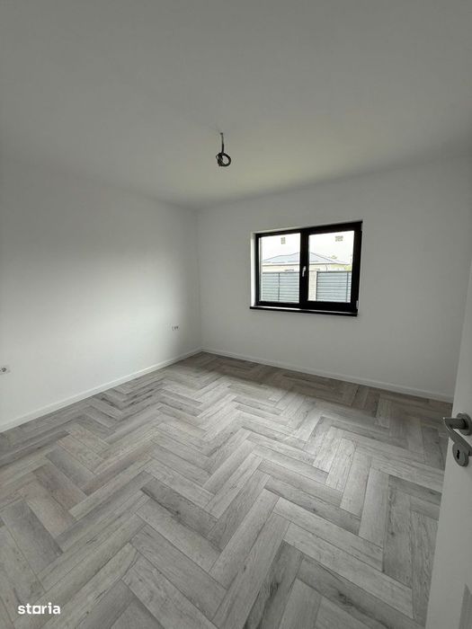 Casa pe parter cu 4 camere , incalzire in pardoseala , teren 400 mp