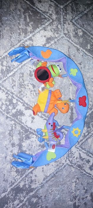 Музыкальная дуга на коляску от Tiny Love