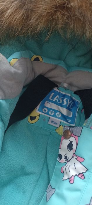 Продам зимний комбинезон Lassye