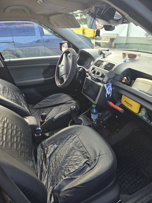 Skoda Fabia 2.     1.2 Benzină