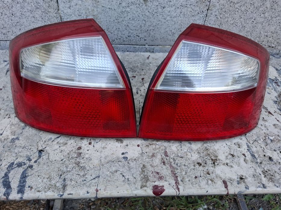 Stopuri Triple Audi A4 B6 Limuzina prețul afișat este pe bucata!