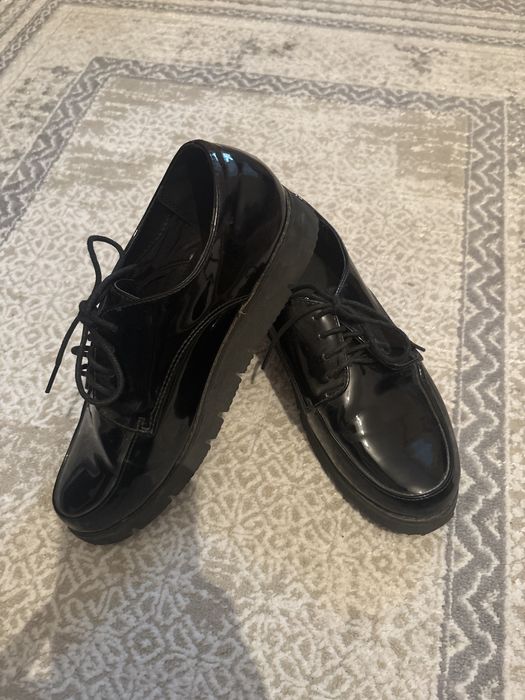 Лакированные ботинки