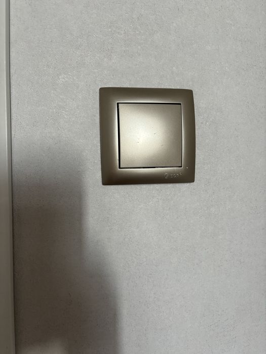 Выключатель серый матовый