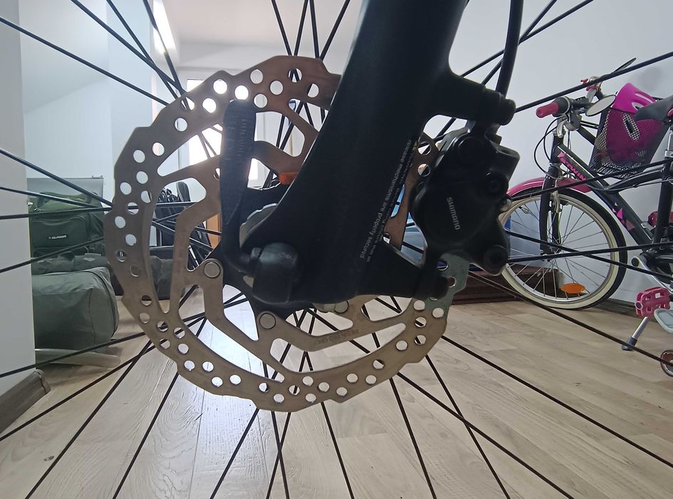 Bicicleta trekking Romet Orkan 4 M L/21 - Culori negru/rosu - Stare foarte buna