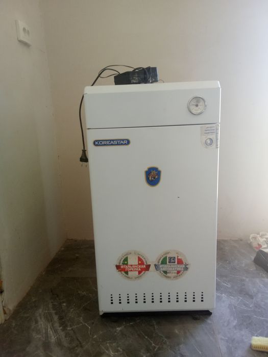Газовый катель напольный