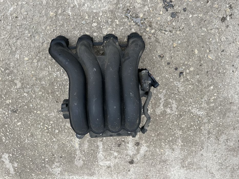 06B 133 210 BJ всмукателен колектор за Ауди А4 B7 2.0i