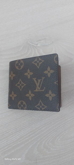 Портфейл на Луис витон