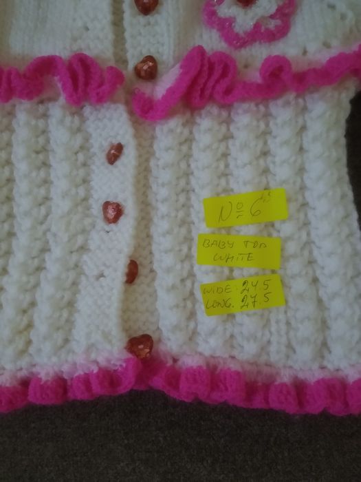 Ръчно плетени бебешки дрешки