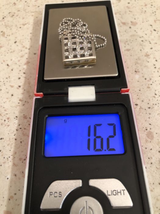 Продам золотую цепь с кулоном.