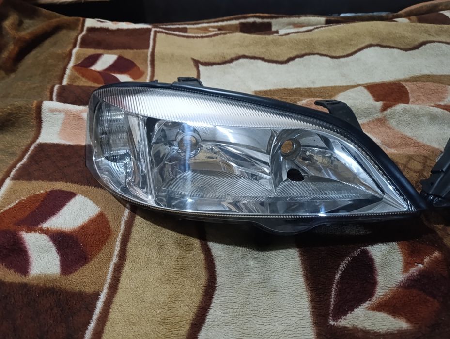Фары на Опель астра Джи