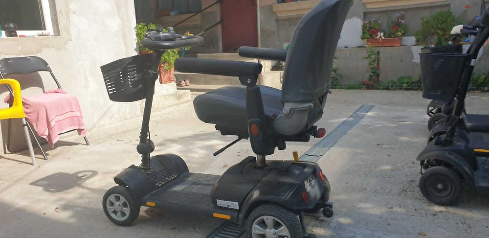 Carut-scuter-carucior electric EXCLUSIV dizabilitati ca NOU !!!