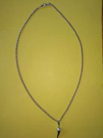 Амулет - ЗУБ древней акулы с серебряным наконечником