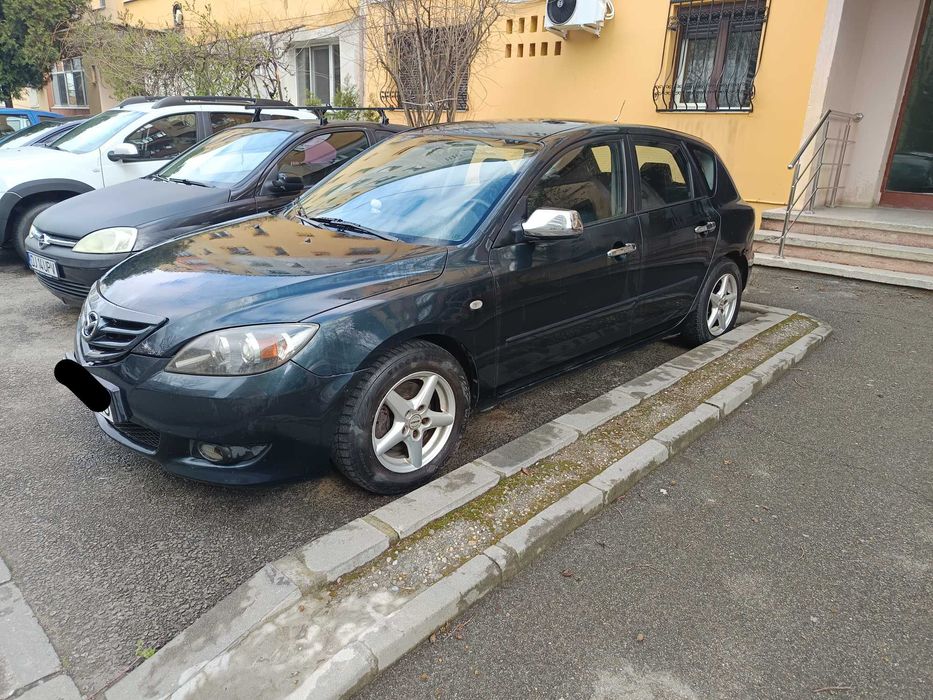 Mazda 3 an 2006.