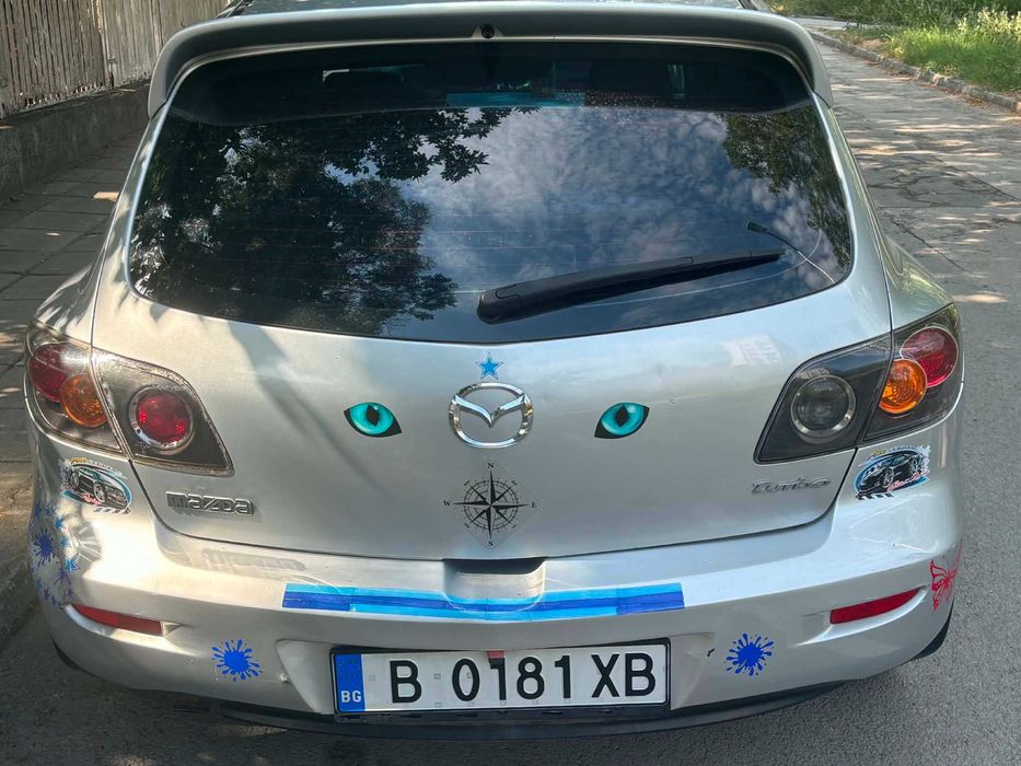 Автомобил Мазда 3
