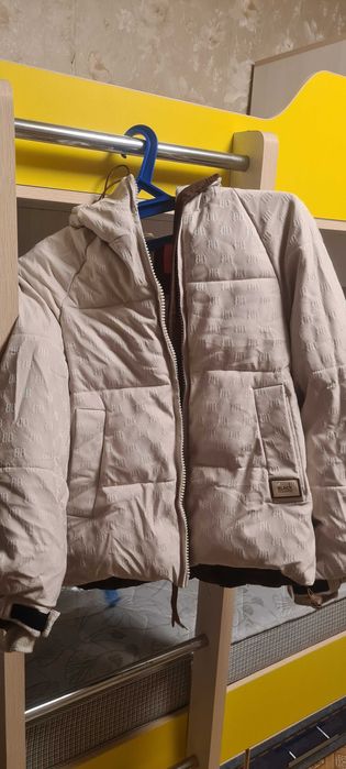 Продам зимние куртки б/у