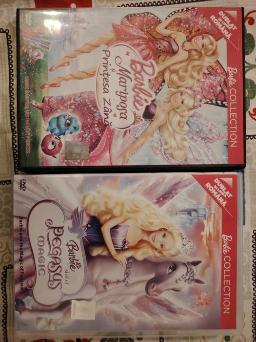 Vând DVD cu filme din seria Barbie