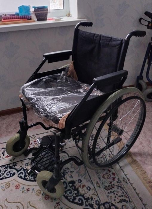 Инвалидное кресло