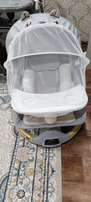 Продам автоматический шезлонг музыкальный