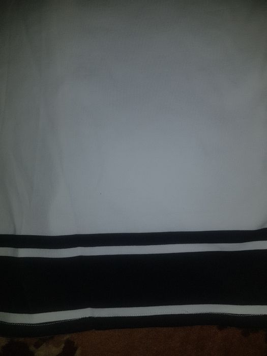 Продам юбку белую с черными полосками