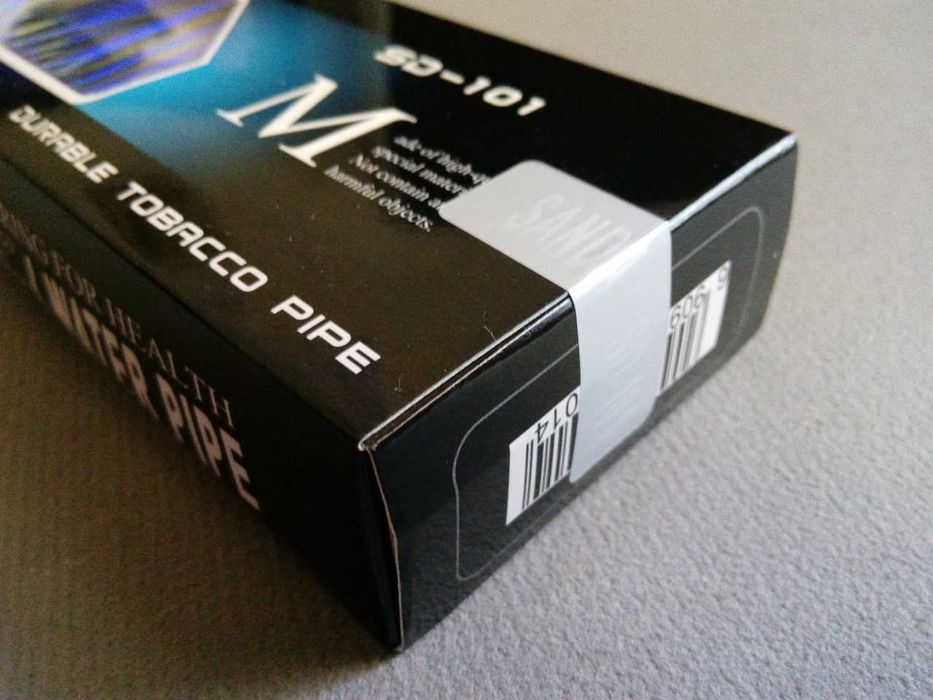 курительные трубки в запечатанных коробках.