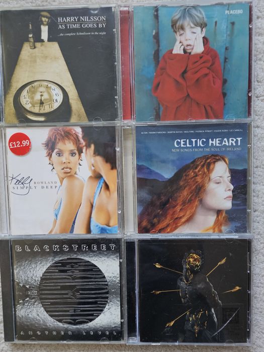 Оригинални компакт дискове от лична колекция