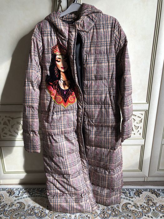 Женил Пуховик