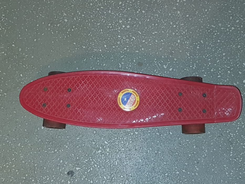 Penny board cu roți de silicon.
