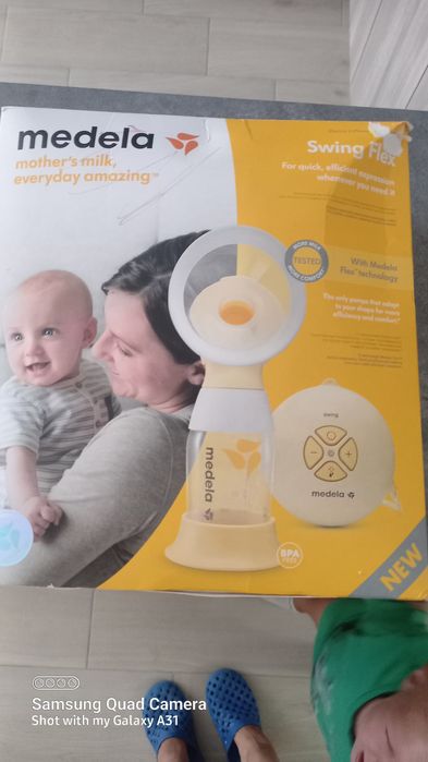 Помпа за кърма medela sling flex