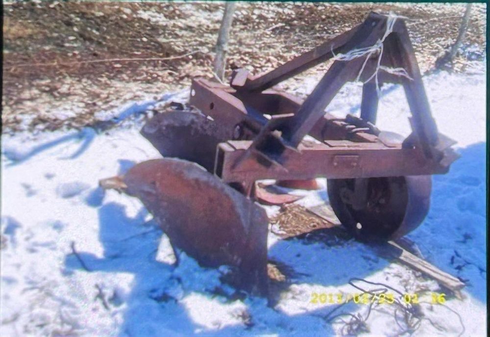 Плуг на трактор двухбрусный