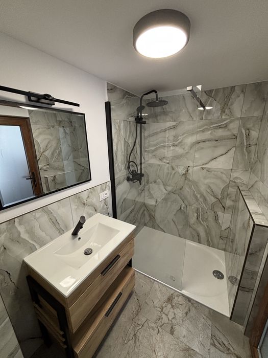 Apartament la casa cu curte