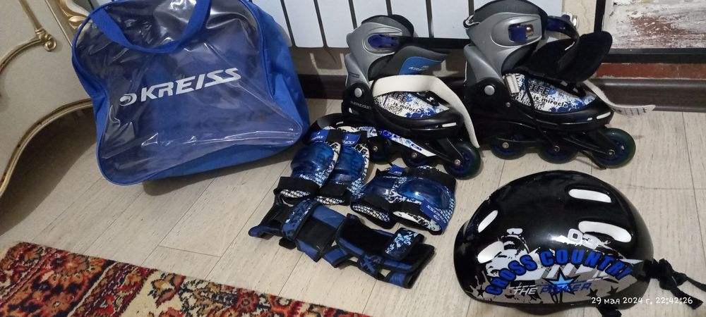 Роликовые коньки