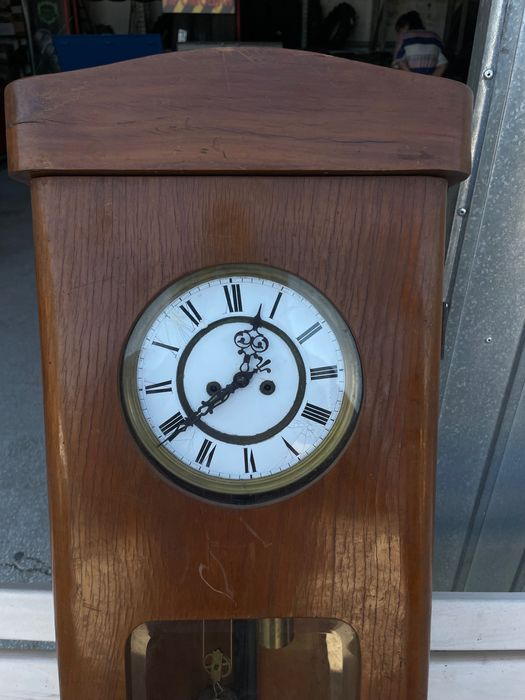 Стенен часовник с махало