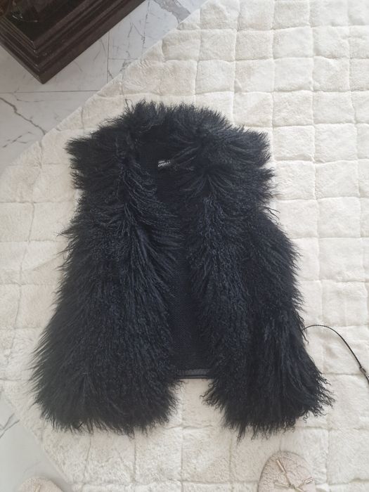 Vesta blana miel mongolez