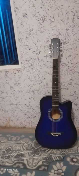 Gitara yangi 38 duyumli