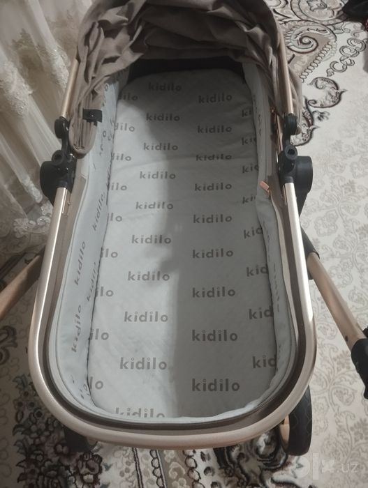 Bolalar kolyaskasi kidilo