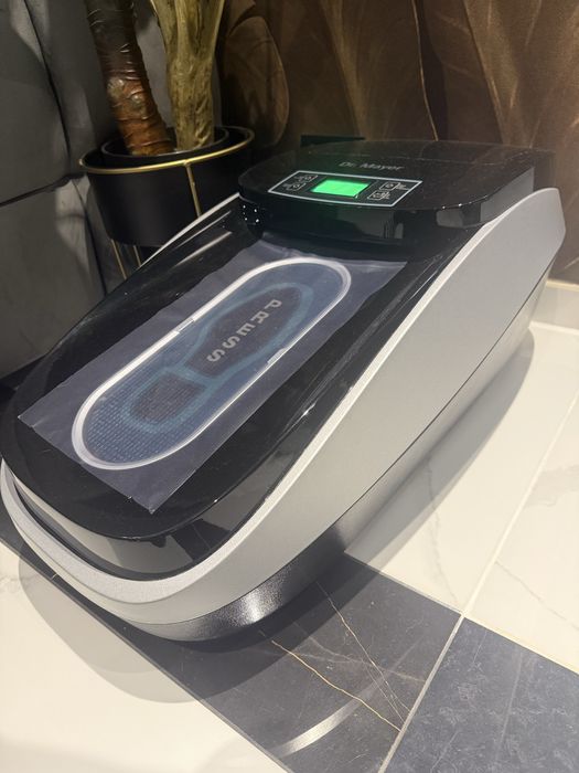 Aparat pentru acoperirea pantofilor  DR.MAYER