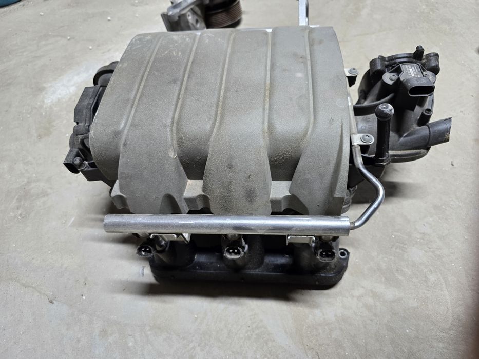 Коллектор на ауди а6 с6