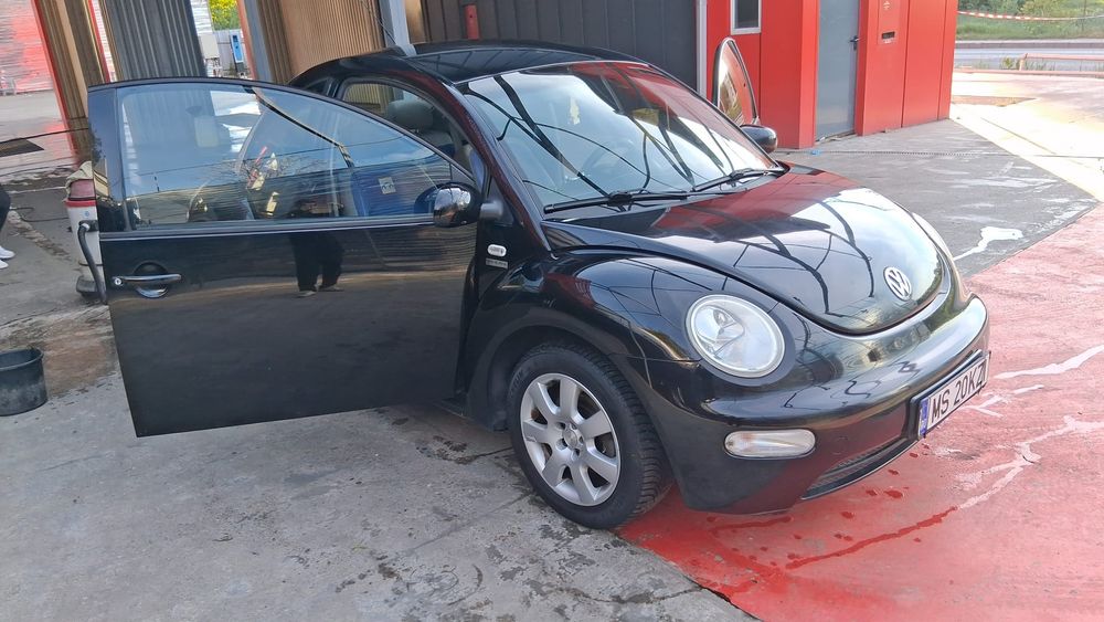 schimb vw new beetle