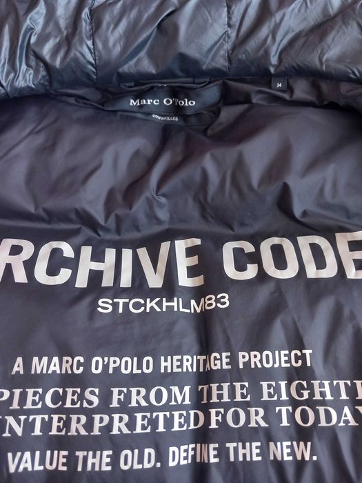 Дълга грейка с пух Marc O Polo подходяща за прдстпящия сезон