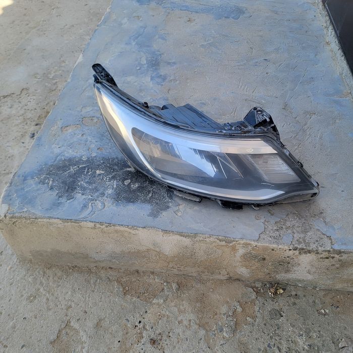 Киа рио передни фар . год 2015