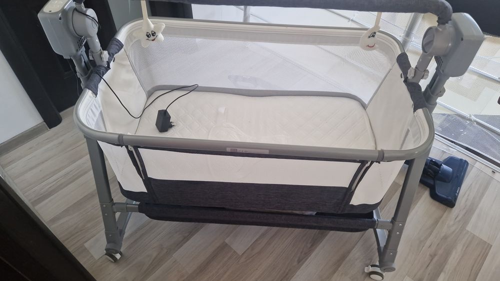 Patut electric  pătuț electric multifuncțional pentru bebeluși de tip co-sleeper  CLD Care Love Devotion.