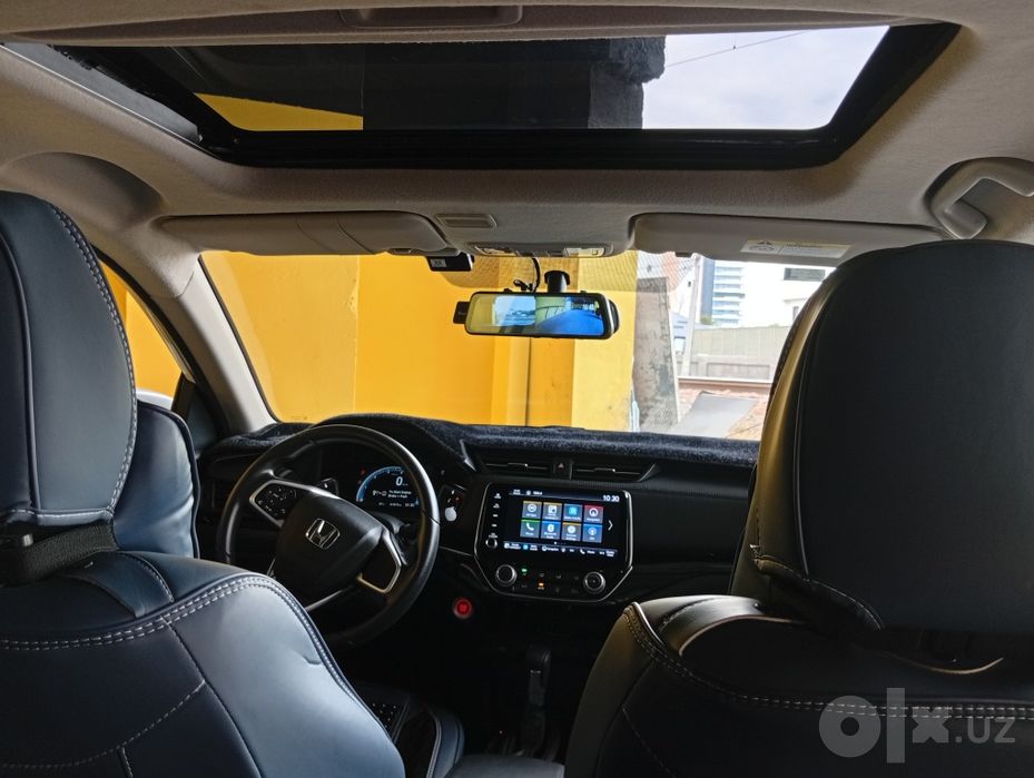Авто мобил Honda crider