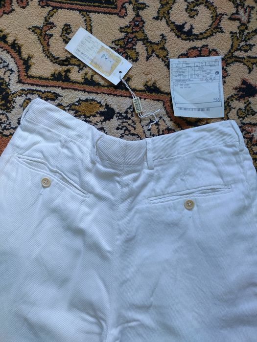 S. Ferré. Pantaloni albi