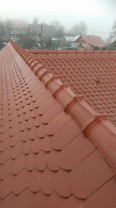 Acoperisuri mansarde tigla metalica veluxurisi reparatii de irgrnta