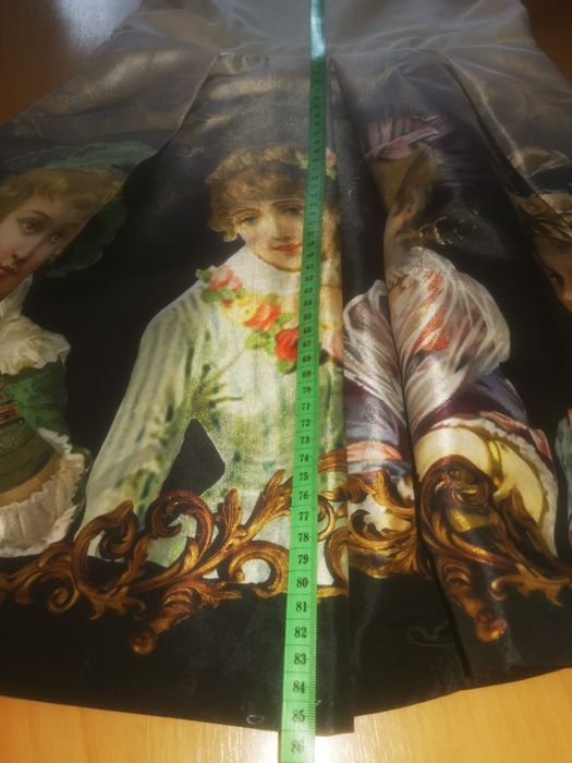 Ефектна рокля с ангели