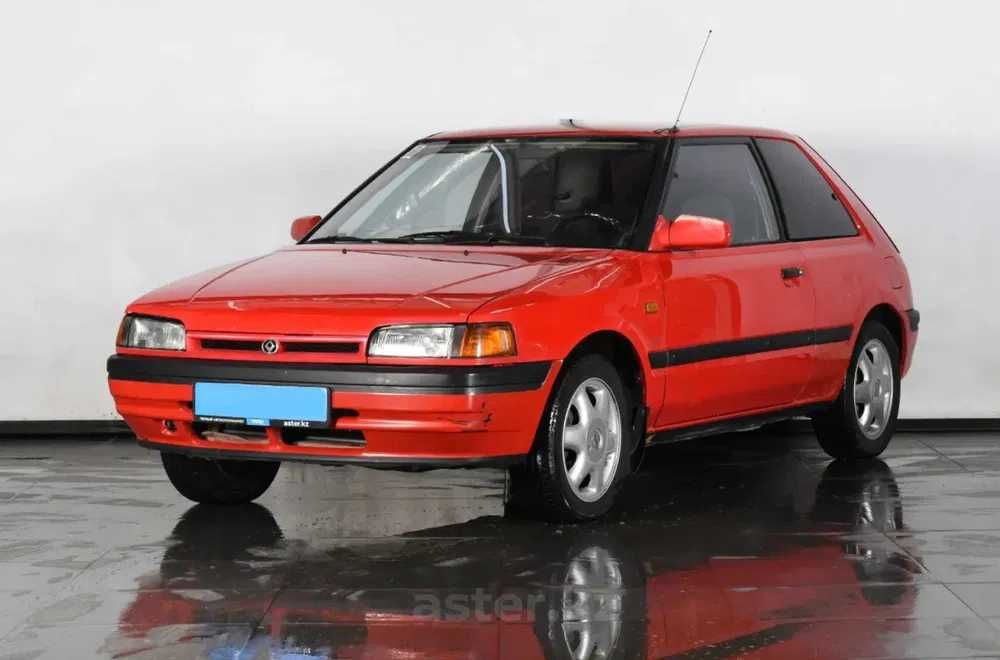 Бампер задний на Мазда 323 92-/Mazda 323 -94