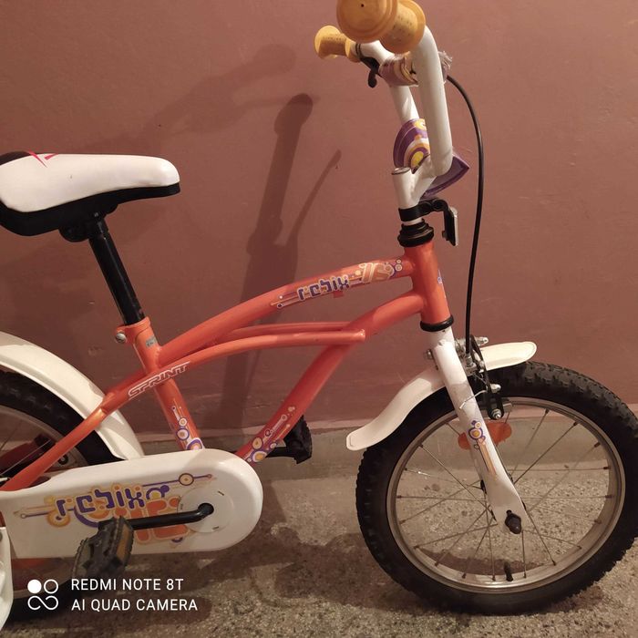 Велосипед за момиче и момче с помощни колелца