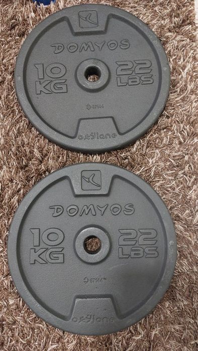 Set 2 discuri de greutate DOMYOS din fontă – 10 kg fiecare, 20 kg în total