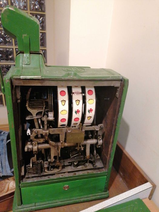Vand joc mecanic JENNINGS DUTCH BOY 5 CENT Slot Machine. Nu